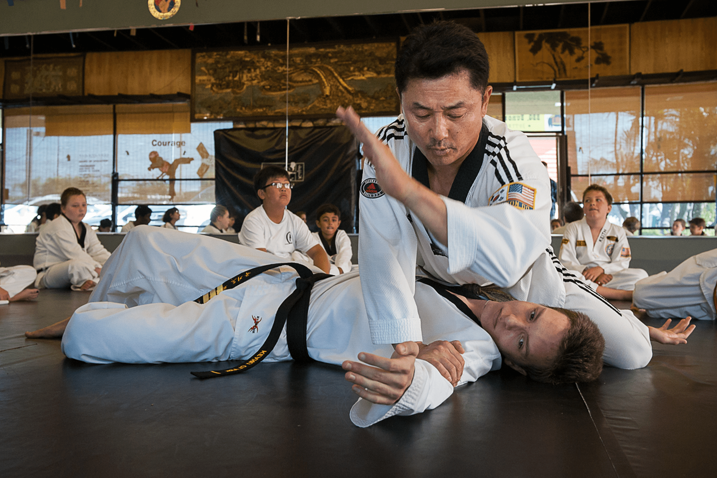 Taekwondo class learning self-defense moves